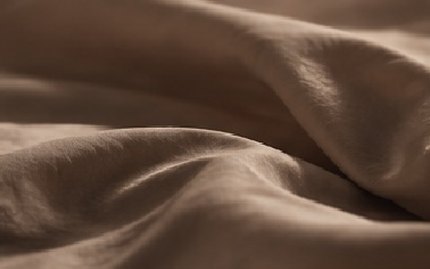 Crumpled linen in soft light
